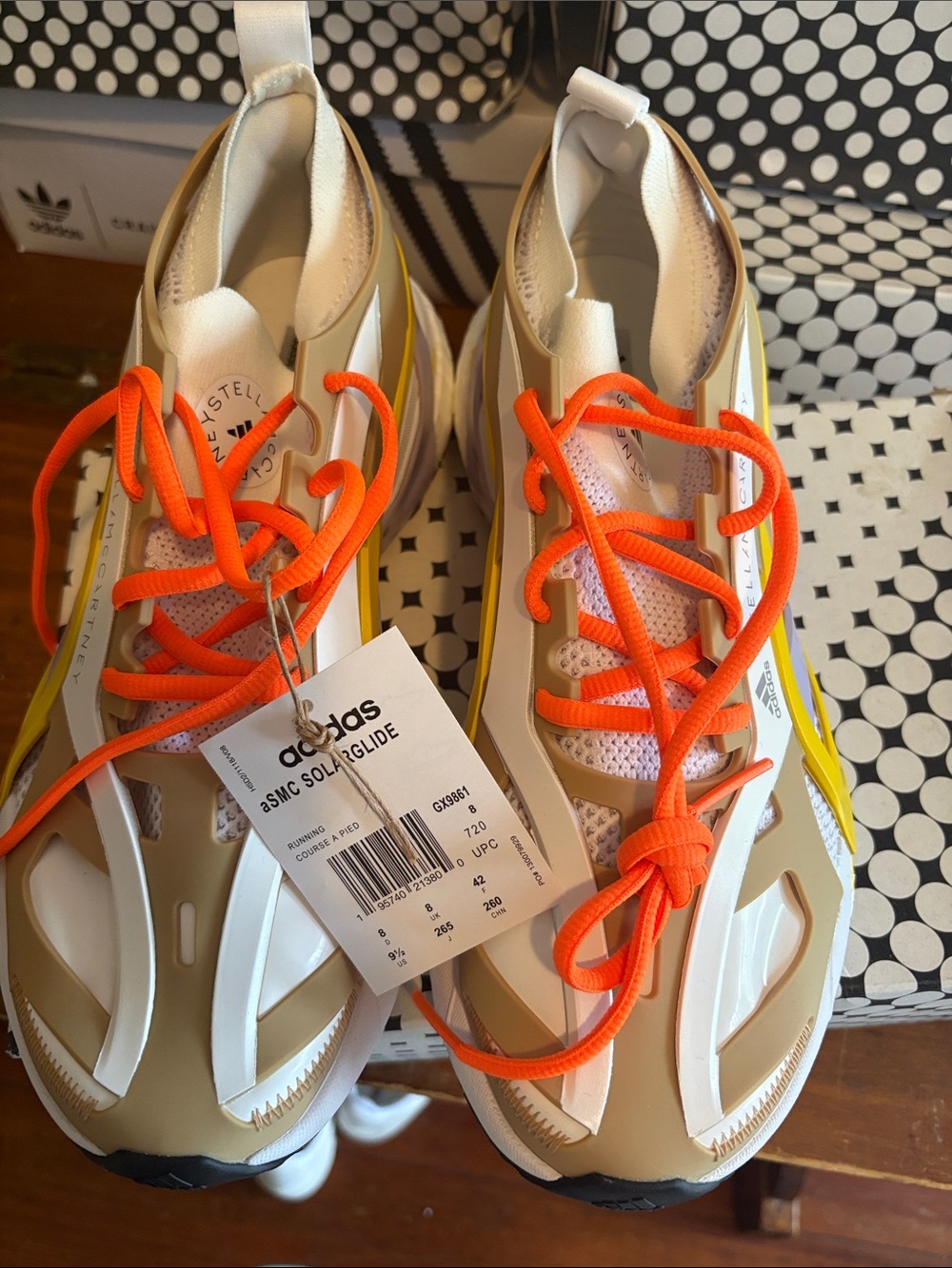 adidas Women’s White, Orange & Yellow SMC Solar Glide Sneaker